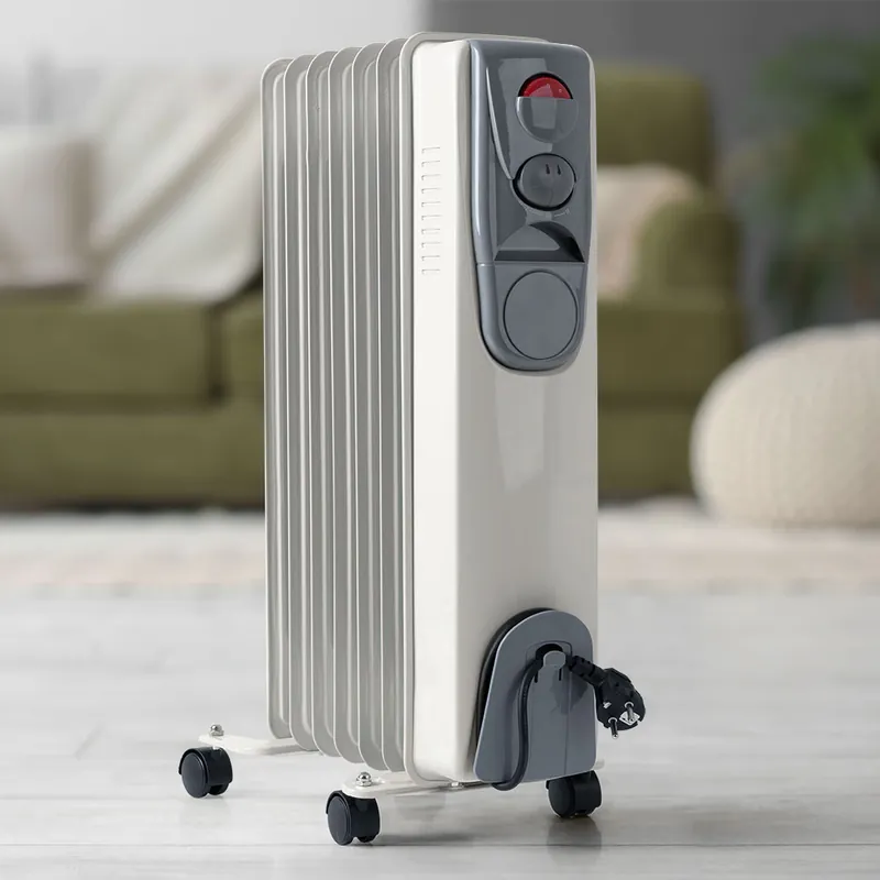 Olie radiator, regelbare thermostaat, 3 niveaus, wielen, H 62 cm Rechtstreeks Van De Fabrikant